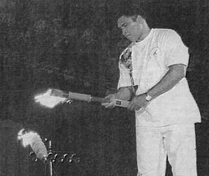 Muhammad Ali lights the Olympic flame.